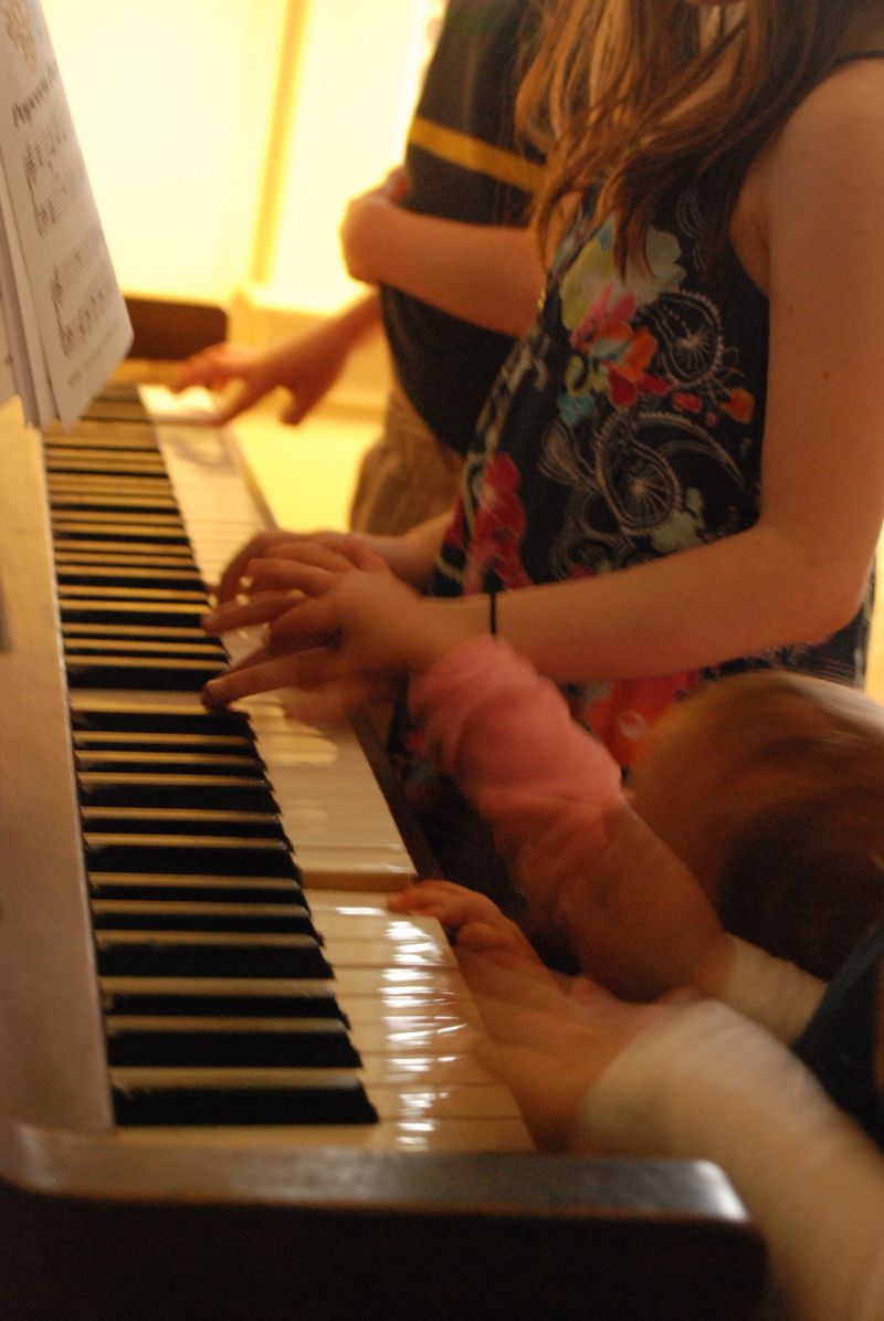 beautiful sounds...four sets of little hands on the piano